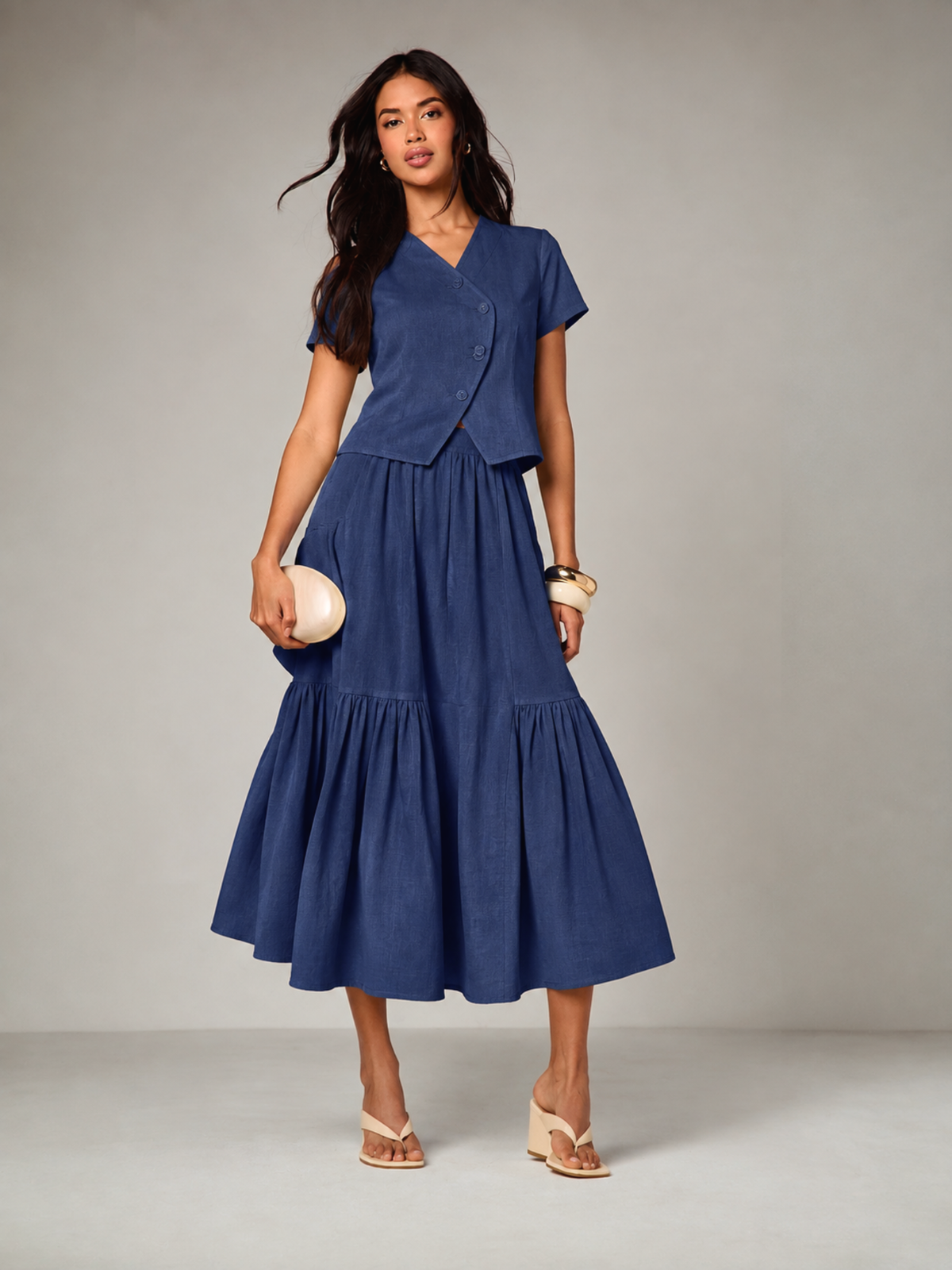CHLOE blue top and skirt co-ord set for women, full-length with nude heels and clutch