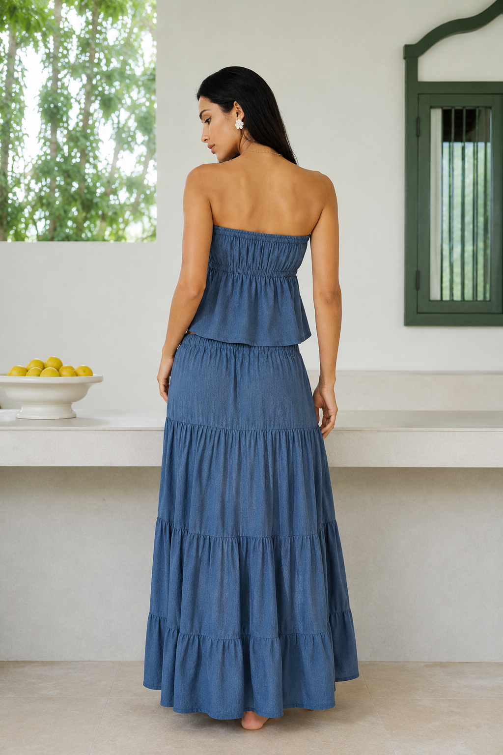 Back view of Aloha blue strapless top and tiered maxi skirt co-ord set
